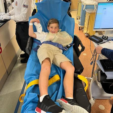 Theodore James Kushner broke his hand while playing soccer.